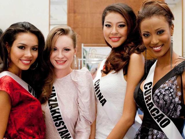 Miss Vietnam Hoang My Vu, Miss Kazakhstan Valeriya Aleinikova, Miss China ZiLin Luo, and Miss Curacao Eva Van Putten, prepare for registration and fitting at Hilton Sao Paulo Morumbi in Sao Paulo, Brazil. PHOTO:AFP/Miss Universe Organization