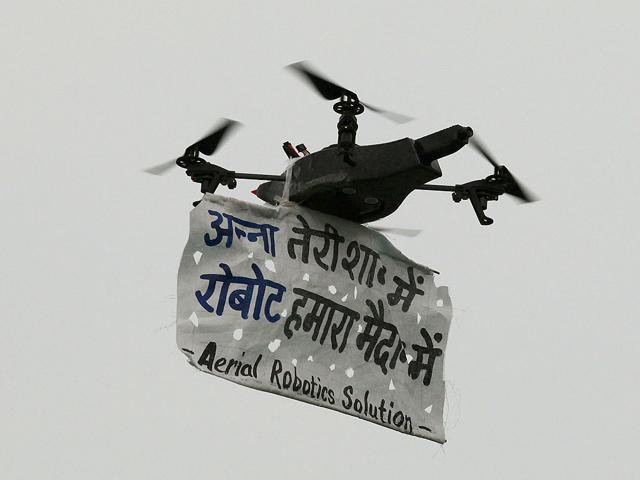 A Robot Helicopter carrying a Anna Hazare's message during the 11th day of Anna Hazare fast against corruption at Ramlila Ground.