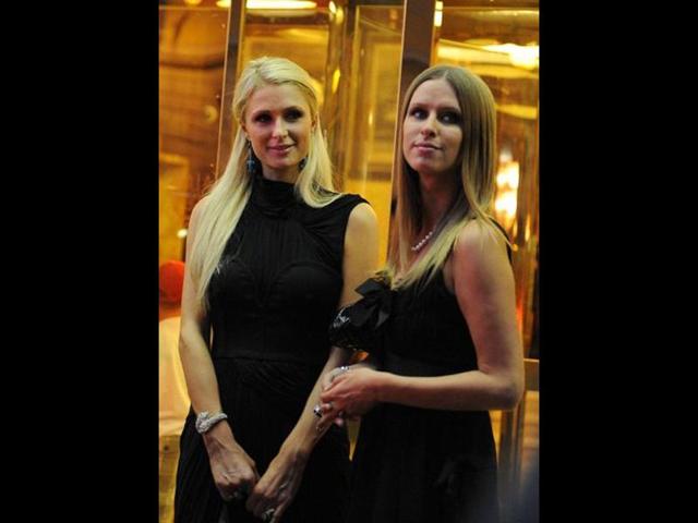 Paris Hilton and her sister Nicky leave their hotel for the rehearsal dinner. Photo: AFP/Tiziana Fabi