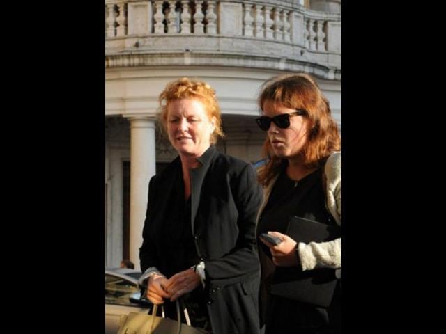 The Duchess of York Sarah Ferguson (L) arrives with her daughter. Photo: AFP/Tiziana Fabi