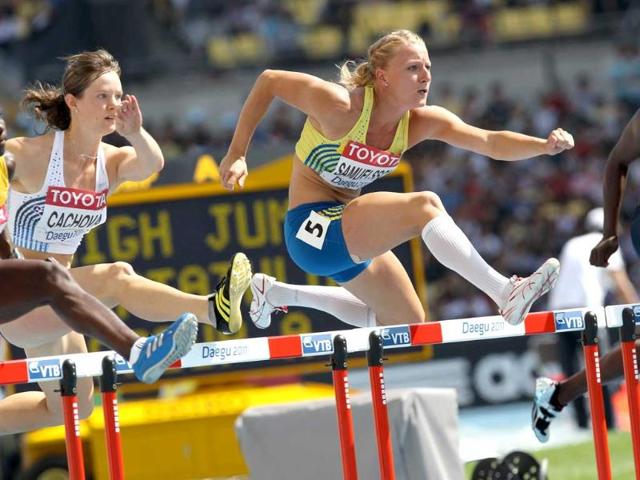 Sweden's Jessica Samuelsson competes in the 100 metres hurdles of the women's heptathlon event at the International Association of Athletics Federations World Championships in Daegu.