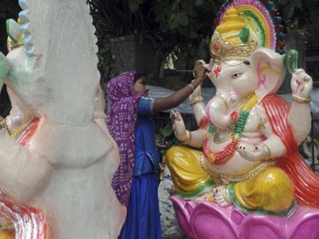 Final touches are given to an idol of Lord Ganesh on the eve of the 12 day festival starting September 1.