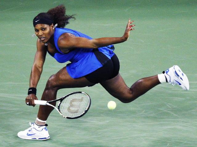 Serena Williams of the United States, returns against Bojana Jovanovski of Serbia, during the first round of the US Open tennis tournament in New York.