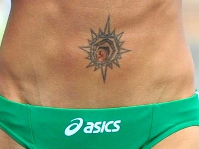 A picture shows the tattoo on the stomach of Bulgaria's Ivet Lalova after she competed in the women's 100 metres heats at the International Association of Athletics Federations (IAAF) World Championships.