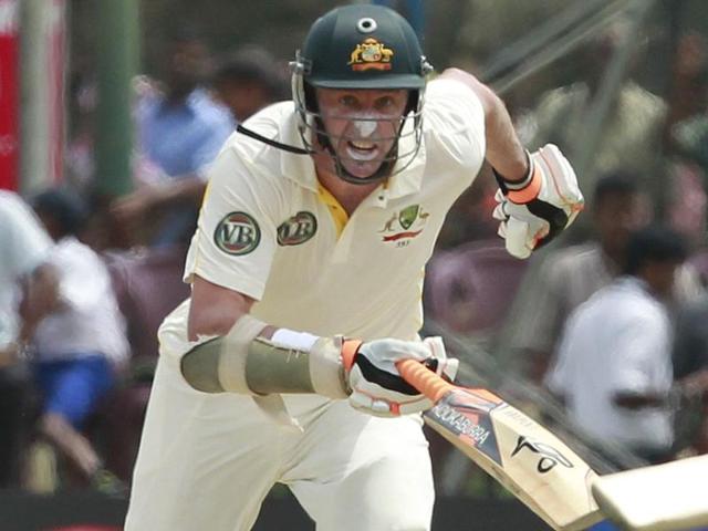 Australia's Michael Hussey runs between wickets during the first day of their first Test match against Sri Lanka in Galle.