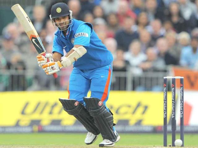 Ajinkya Rahane bats during the 20-20 cricket match between England and India at Old Trafford cricket ground in Manchester, north-west England.