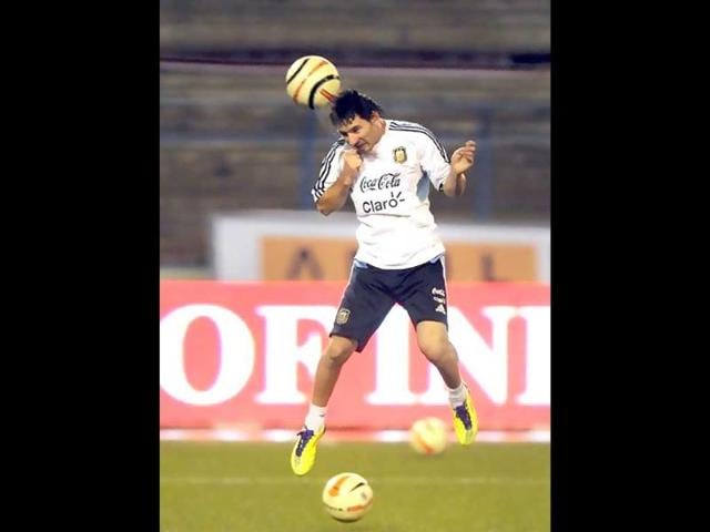 Lionel Messi practises during a training session ahead of the match in Kolkata. Argentina 's football team, lead by the newly elected captain Lionel Messi, came to Kolkata to play in the first ever FIFA Friendly International Match on the Indian subcontinent against Venezuela.
