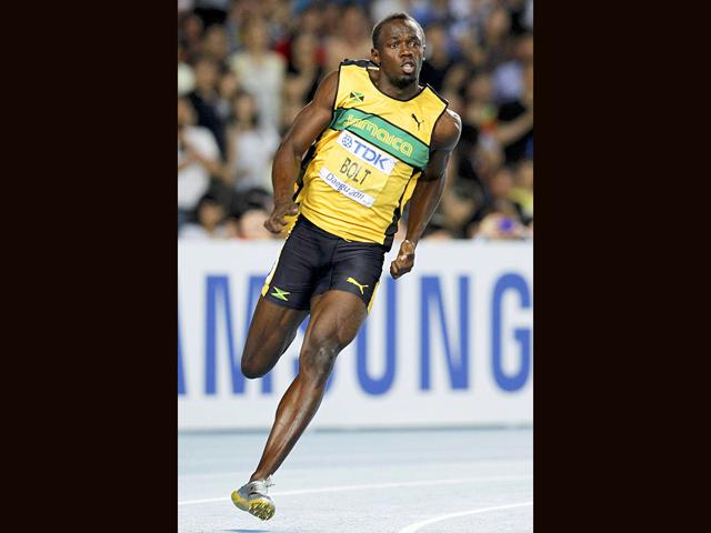 Usain Bolt of Jamaica runs through a corner on the way to winning the men's 200 metres final at the IAAF World Championships in Daegu.