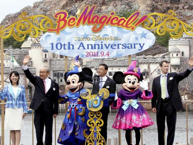 (L-R) Tokyo Disney Resort ambassador Tomoko Baba, Oriental Land chairman and CEO Toshio Kagami, Mickey Mouse, Oriental Land president Kyoichiro Uenishi, Minnie Mouse and Walt Disney Parks and Resort Worldwide chairman Tom Staggs celebrate the 10th anniversary of Tokyo DisneySea at Urayasu city, suburban Tokyo. Tokyo DisneySea will celebrate the entertainment program "Be Magical" through till March 19, 2012 for the 10th anniversary of the Disney theme park.