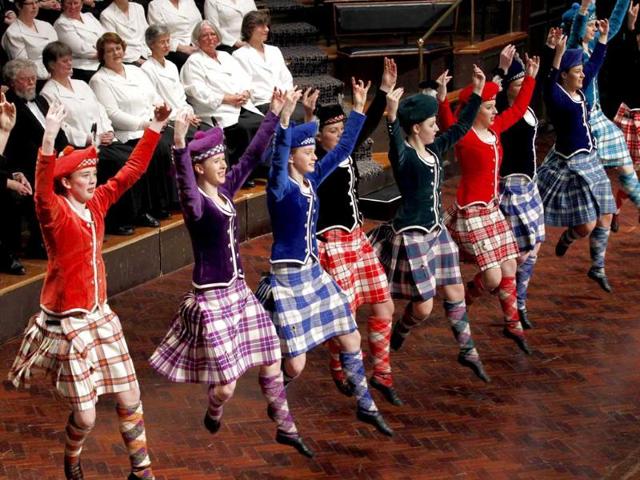 A group of girls perform a Scottish dance during the official welcome ceremony for Argentina's rugby team, for the 2011 Rugby World Cup, at Dunedin City Hall.
