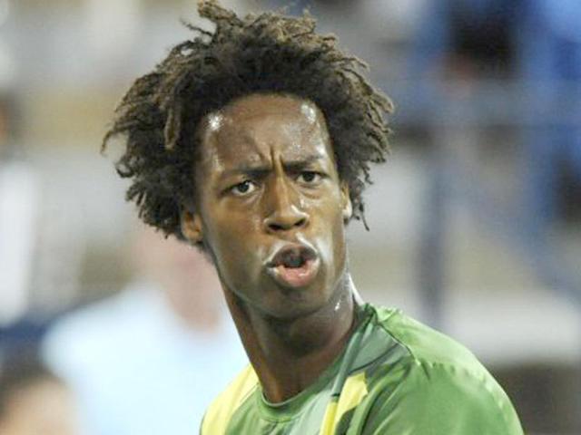 Gael Monfils of France reacts after returning a shot to Grigor Dimitrov of Bulgaria during the US Open tennis tournament.