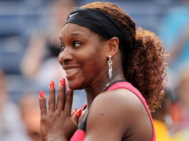 Serena Williams of the US makes a face during an interview after her win over Michaella Krajicek of Netherlands during a Women's single match at the US Open tennis tournament.