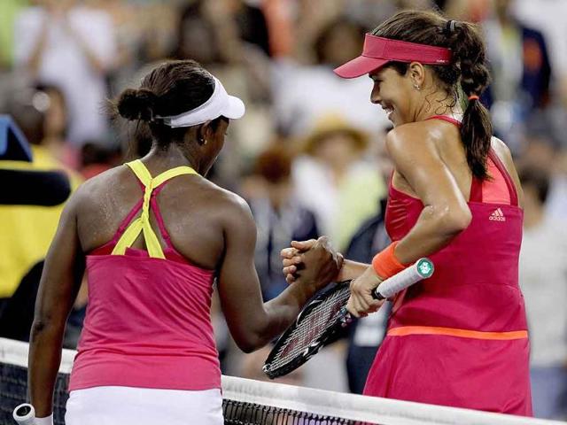 Sloane Stephens of the United States congratulates Ana Ivanovic of Serbia after their match during Day Six of the 2011 US Open at the USTA Billie Jean King National Tennis Center.