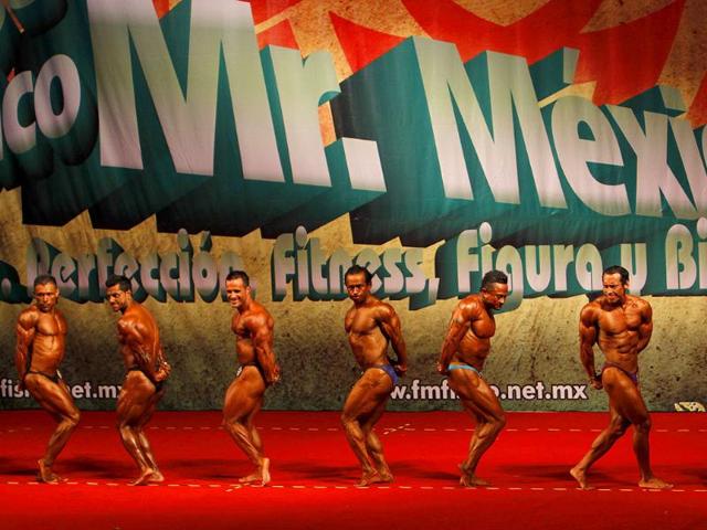 Men compete during the Mr Mexico bodybuilding contest in Mexico City.