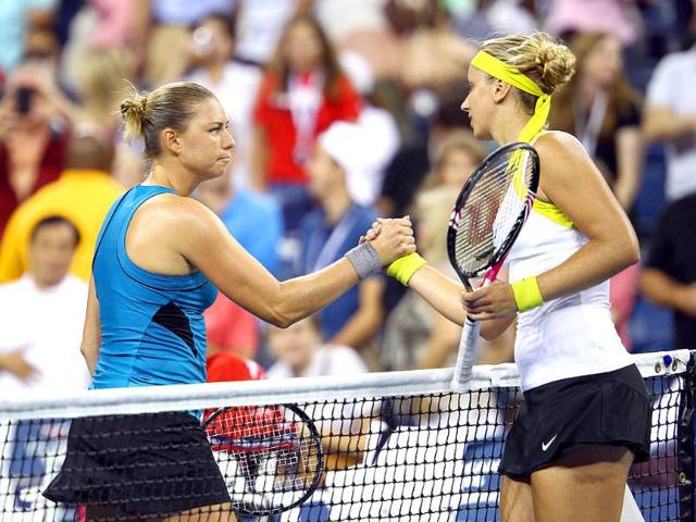 Vera Zvonareva of Russia shakes hands with Sabine Lasicki of Germany after their match during Day Seven of the 2011 US Open at the USTA Billie Jean King National Tennis Center on September in the Flushing neighborhood of the Queens borough of New York City.