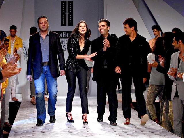 Karan Johar cracks Katrina Kaif up as they walk down the ramp.