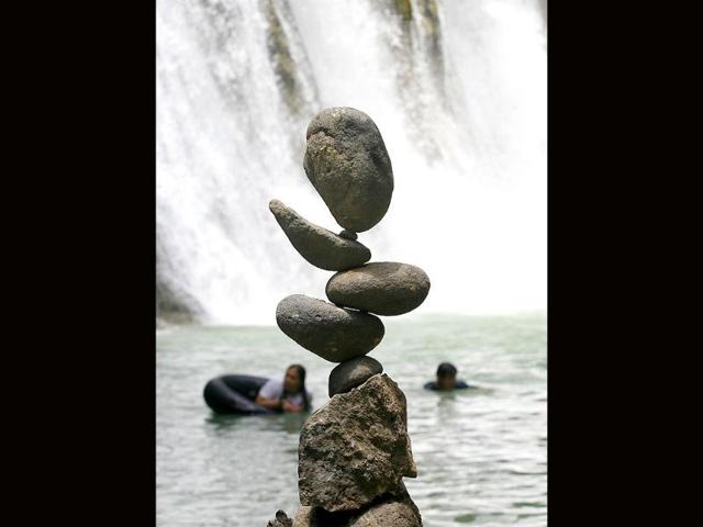 An arrangement of stones is pictured at Daranak falls in Tanay, Rizal province, east of Manila after a rock balancing performanc.