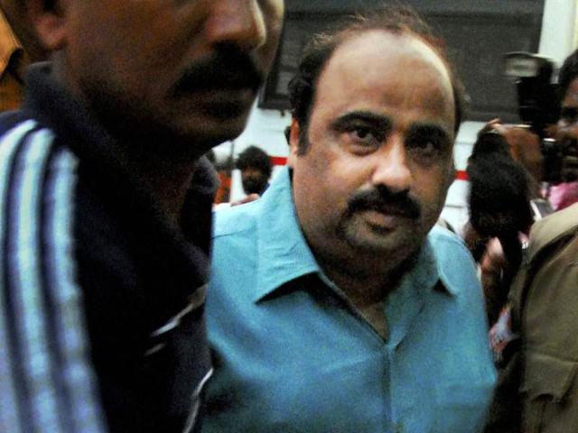 Obulapuram Mining Company (OMC) director B Srinivas Reddy being taken to Chanchalguda central prison in Hyderabad on Monday. CBI team arrested Janardhana Reddy after raiding his residence at Bellary, Andhra Pradesh early Monday in an illegal mining case.