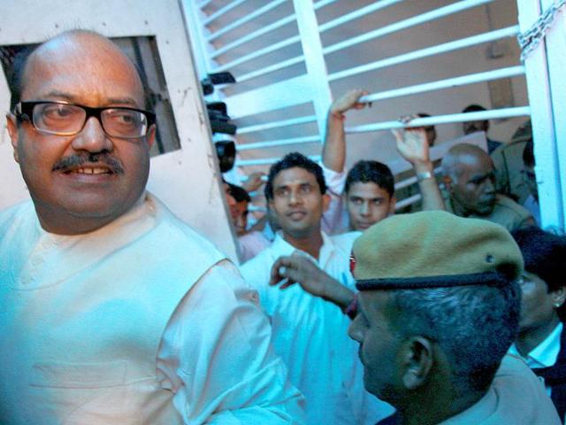 Rajya Sabha MP Amar Singh, who was arrested for his alleged role in the cash-for-votes scandal being taken to Tihar Jail from Tis Hazari court in New Delhi.