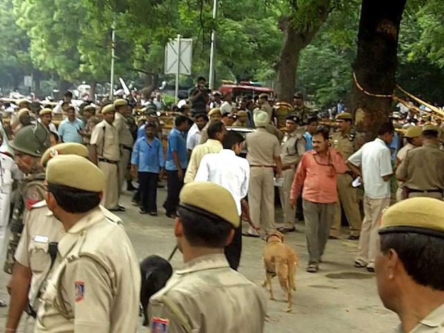 Security personnel outside the Delhi high court after the blast.