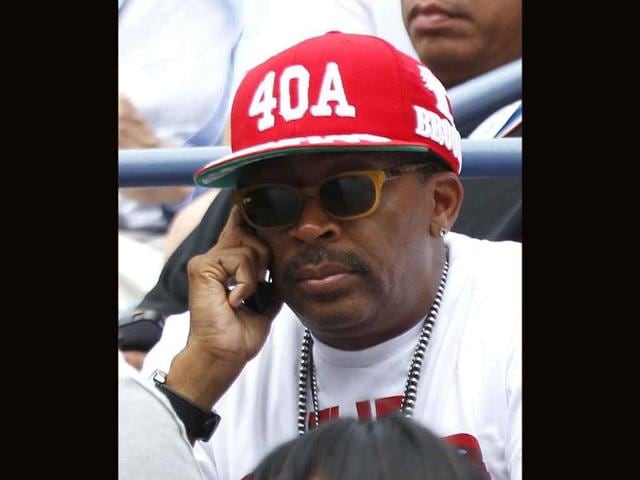 Director Spike Lee watches Serena Williams play Ana Ivanovic of Serbia during the US Open tennis tournament in New York.