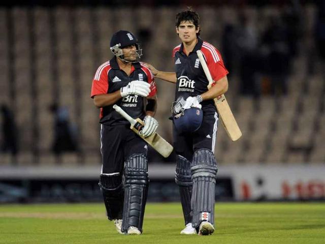 England's captain Alastair Cook (R) and Samit Patel leave the field after England defeated India in the second one-day international cricket match at the Rose Bowl cricket ground in Southampton, England.