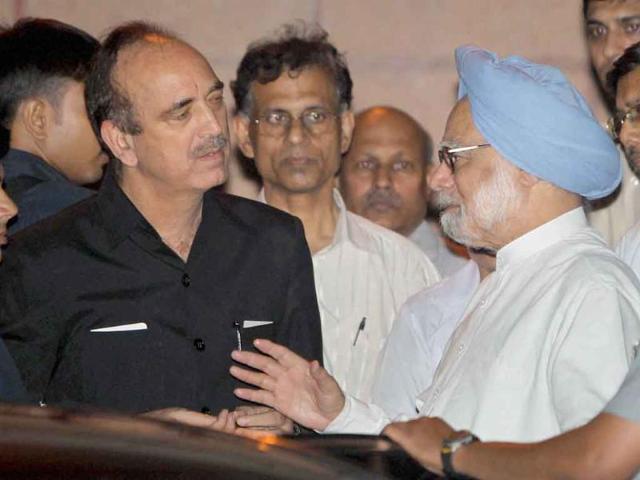 Prime Minister Manmohan Singh talks to health minister Ghulam Nabi Azad after visiting the injured persons of the High Court blast, at RML hospital in New Delhi.