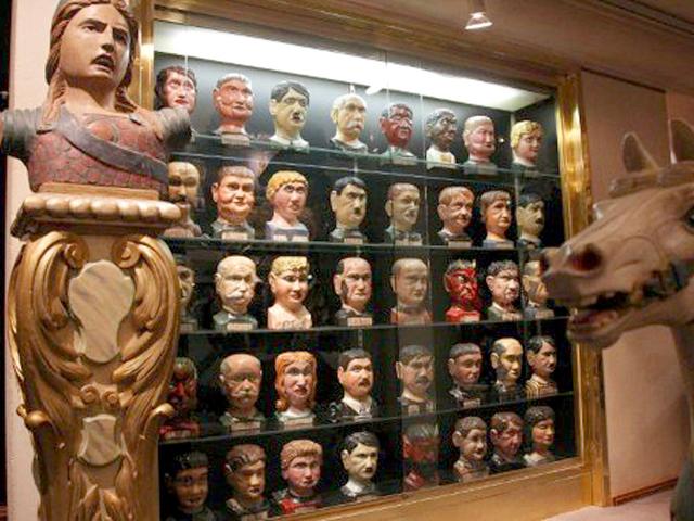 A picture taken at Cornette Saint-Cyr auction house in Paris, shows a wooden political slaughter game, "Hitler's gang", displayed prior to the auction "Chefs-d'Oeuvre de l'Art Forain" which will take place on September 28 and 29.
