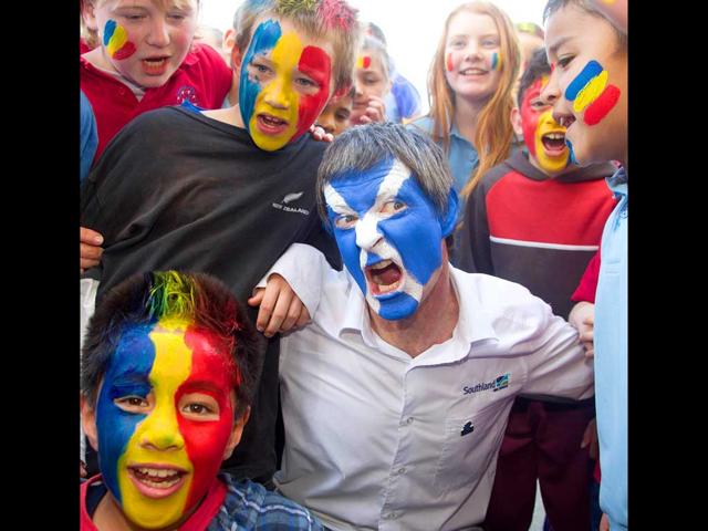 Scotland and Romanian rugby fans react at Rugby League Park, as teams prepare for the 2011 Rugby World Cup, in Wellington.