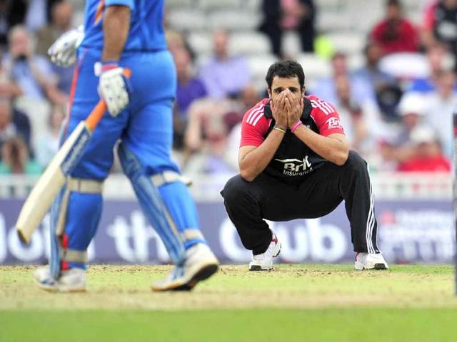 England's Ravi Bopara shows his disappointment as Mahendra Singh Dhoni hits another boundary during the third one day cricket match between England and India at The Oval, London.