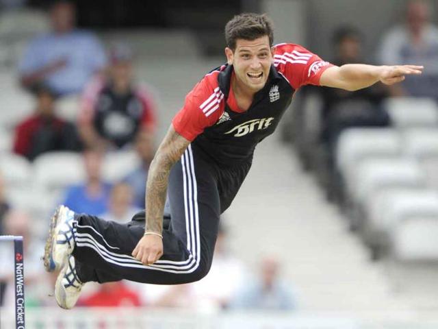 England's Jade Dernbach bowls to Mahendra Singh Dhoni during their one day international cricket match at the Oval cricket ground, London.