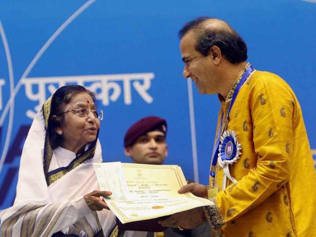 President Pratibha Patil presents Best Playback Singer Award to Suresh Wadekar during the '58th National Film Awards Function' in New Delhi.