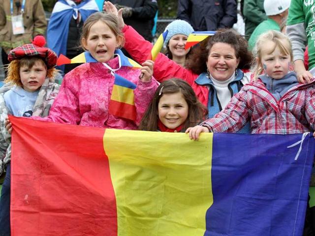 Romanian fans hold their flag during the 2011 Rugby World Cup pool B match Scotland vs Romania at the Rugby Park stadium in Invercargill.