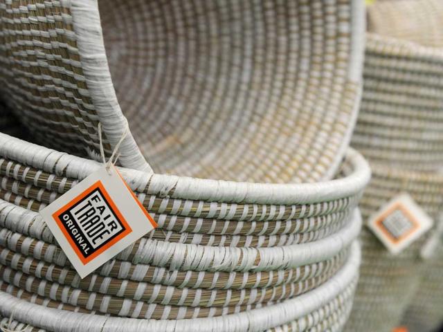 A fair trade emblem can be seen on cotton baskets, made in India, in Dortmund, western Germany, during the "Fair 2011" a exibition for fair trade.