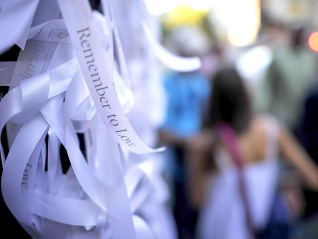 Thousands of white ribbons bearing the words Remember to Love, part of an arts project marking 10th anniversary of the 9/11 terrorist attacks, are seen outside St. Paul's Church in downtown Manhattan.