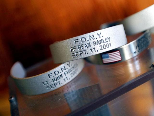 A memorial display of bracelets honoring firefighters who were killed are seen at FDNY Ladder 20 Engine 13 on September 9, 2011 in New York City. Ladder 20 lost seven firefighters.