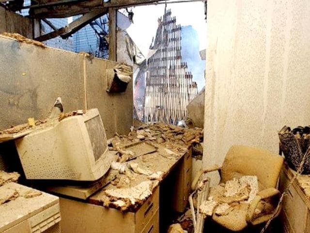 An office filled with dust and damage has a view of the wreckage of the World Trade Center after the Spetember 11, 2001 terror attacks in New York. File photo