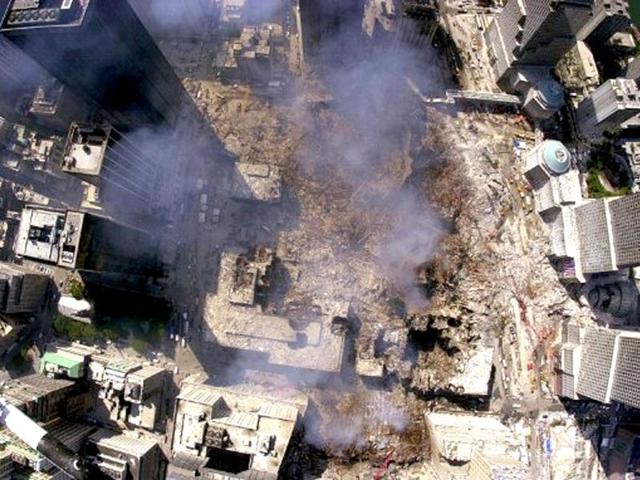 Smoke continues to rise from the destroyed World Trade Center four days after terror attacks on September 11, 2001 in New York. File photo