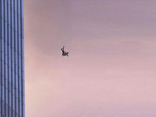 A person falls to his death from the World Trade Center after two planes hit the Twin Towers on September 11, 2001 in New York City. File photo