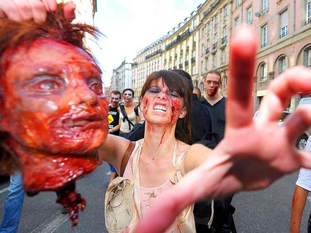 People-dressed-as-zombies-take-part-in-the-Zombie-Walk-event-on-September-10-2011