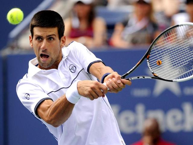 Novak Djokovic plays a shot during the Men's semifinal 2011 US Open match.