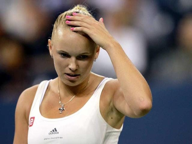 Caroline Wozniacki of Denmark reacts against Serena Williams of the United States during the semifinal of the 2011 US Open at the USTA Billie Jean King National Tennis Center in New York City.