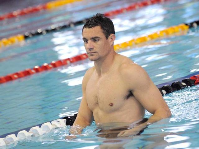 New Zealand All Black fly-half Dan Carter wades in a pool during a team recovery session as they prepare for their next 2011 Rugby World Cup match, in Hamilton.