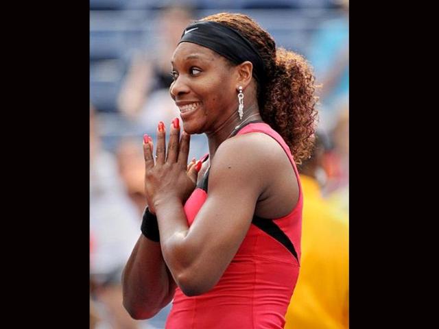 Serena Williams of the US makes a face during an interview after her 6-0, 6-1 win over Michaella Krajicek of Netherlands during a women's single match at the US Open tennis tournament at the Billie Jean King National Tennis Center in New York.
