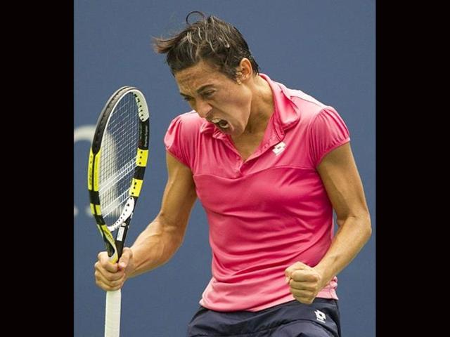 Francesca Schiavone of Italy reacts to a point during her women's match against Anastasia Pavlyuchenkova of Russia at the 2011 US Open tennis tournament in New York.