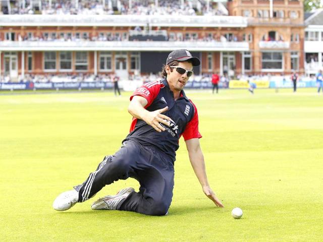 England's Captain Alastair Cook runs after the ball to prevent a boundary and is successful during the fourth ODI between England and India at Lord's cricket ground in London.