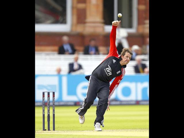 England's Graeme Swann delivers a ball during the fourth One Day International (ODI) cricket match between England and India at Lord's cricket ground in London.