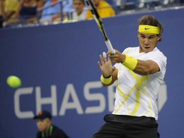 Defending champion Rafael Nadal had a rough start in his round 1 match against Kazakhstan's Andrey Golubev but recovered to beat him 6-3 7-6 7-5.
