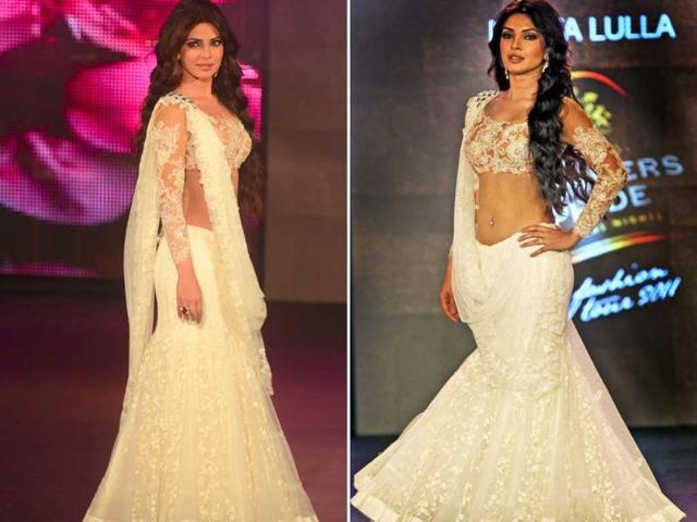 Actor Priyanka Chopra walks the ramp in a Neeta Lulla ensemble at the Seagram's Blenders Pride Fashion tour at Kolkata. Watch ivory blend with coffee as the actress stops the show.