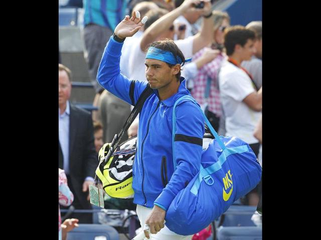 Rafael Nadal of Spain waves to the crowd before the men's championship match against Novak Djokovic of Serbia at the US Open tennis tournament in New York.